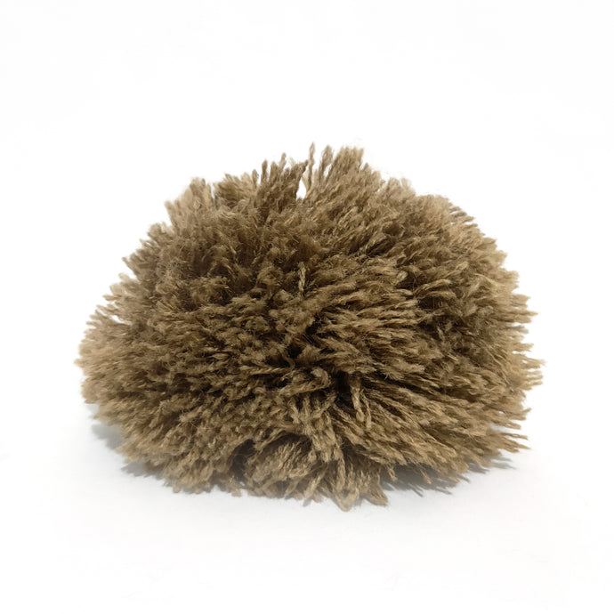 Pompon beige