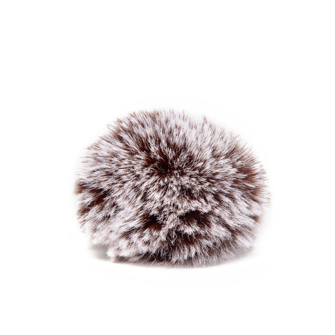 Pompon marron et blanc